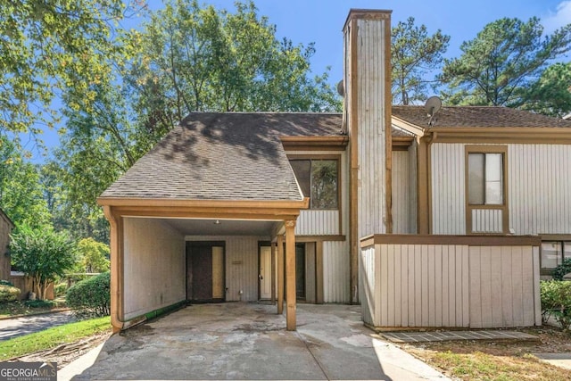 view of front of house with a carport