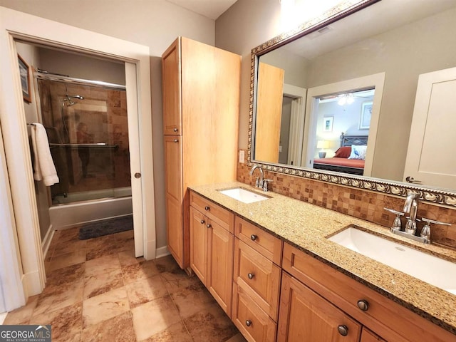 bathroom featuring tasteful backsplash and vanity