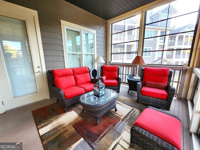 sunroom / solarium with a healthy amount of sunlight