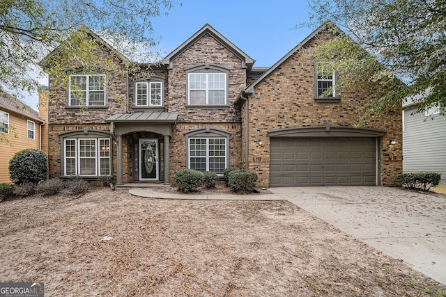 view of front of home with a garage