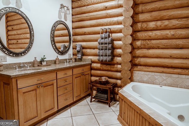 bathroom with tile patterned flooring, rustic walls, vanity, and a bathtub