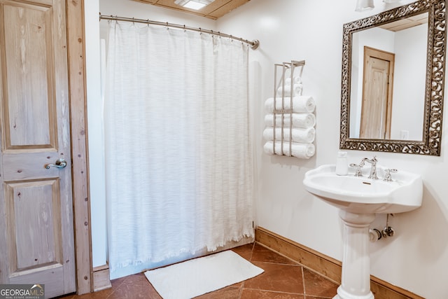 bathroom featuring tile patterned flooring