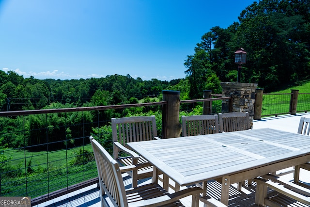 wooden deck with a yard