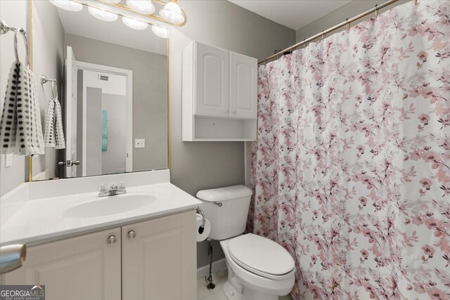 5 Arabian Ave, Alpharetta, GA 30004 - bathroom with toilet, vanity, and a shower with curtain