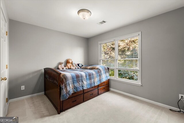 5 Arabian Ave, Alpharetta, GA 30004 - bedroom with light colored carpet, visible vents, and baseboards