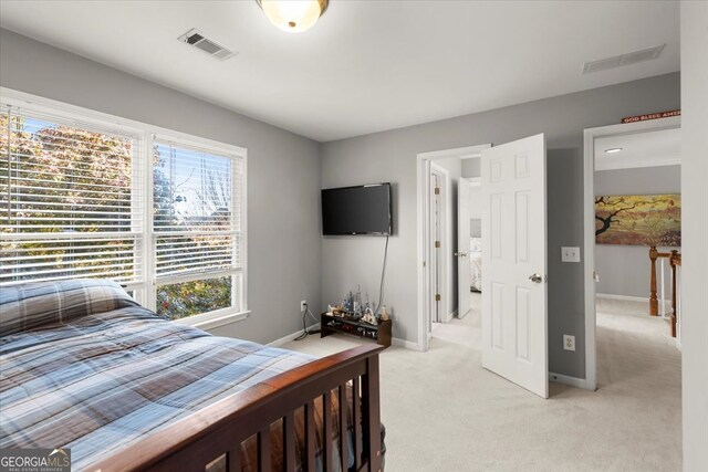 5 Arabian Ave, Alpharetta, GA 30004 - bedroom with visible vents, baseboards, and light carpet