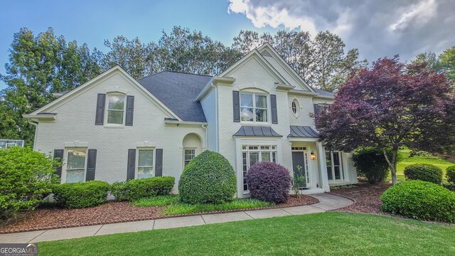 5 Arabian Ave, Alpharetta, GA 30004 - traditional-style house featuring a front lawn and brick siding