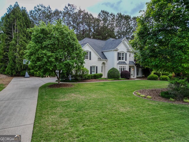 5 Arabian Ave, Alpharetta, GA 30004 - traditional-style home featuring a front lawn and driveway