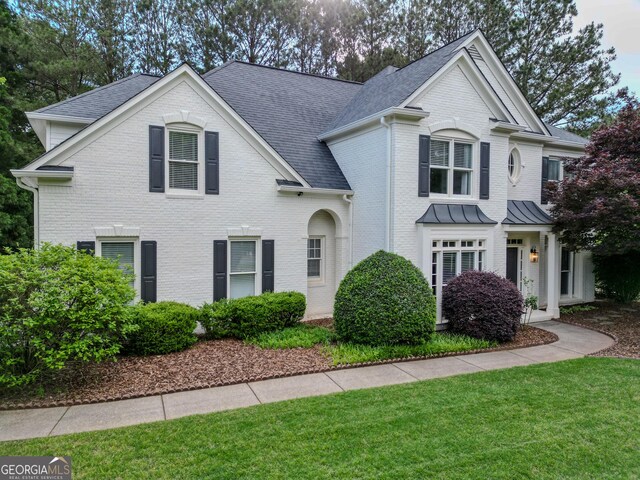 5 Arabian Ave, Alpharetta, GA 30004 - traditional-style house with a shingled roof, brick siding, and a front lawn