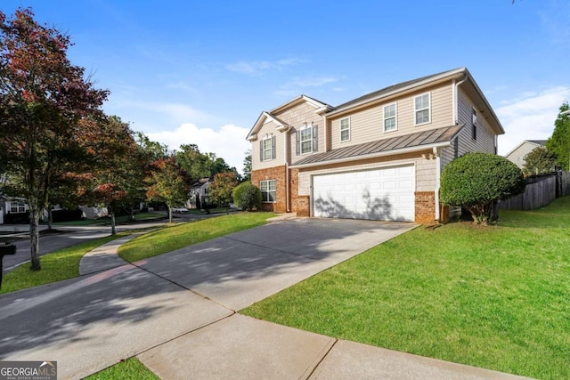 view of front of property featuring a garage and a front yard