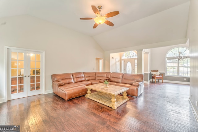 living room with french doors, hardwood / wood-style floors, ceiling fan, and ornate columns