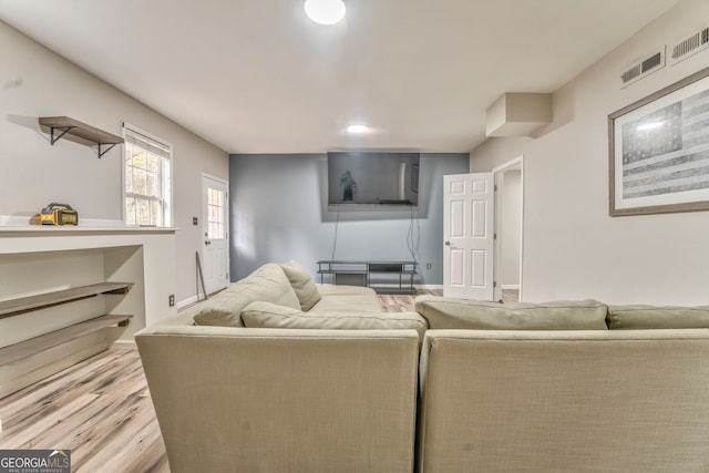 living room featuring light wood-type flooring