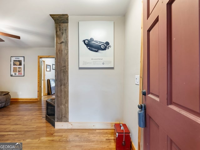 entrance foyer with ceiling fan and light hardwood / wood-style floors