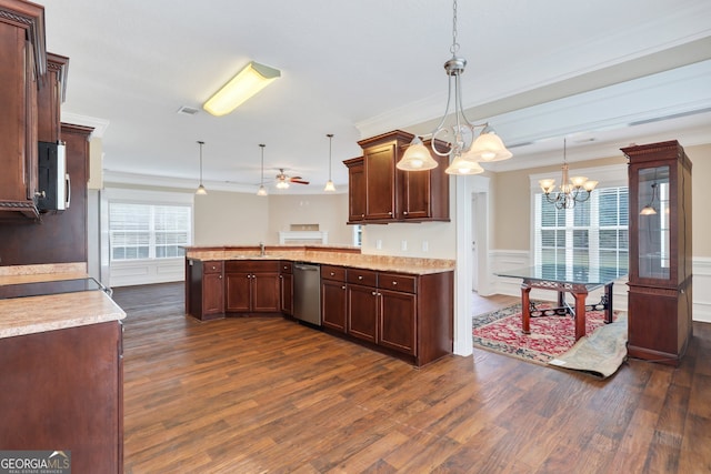 kitchen featuring stainless steel appliances, ceiling fan with notable chandelier, decorative light fixtures, and dark hardwood / wood-style flooring