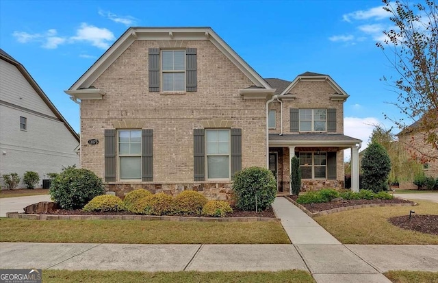 view of front of house with a front lawn