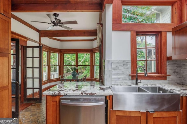 kitchen featuring sink, light stone counters, ceiling fan, dishwasher, and decorative backsplash