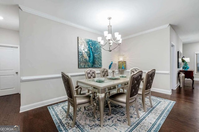 dining area with crown molding, an inviting chandelier, and dark hardwood / wood-style flooring