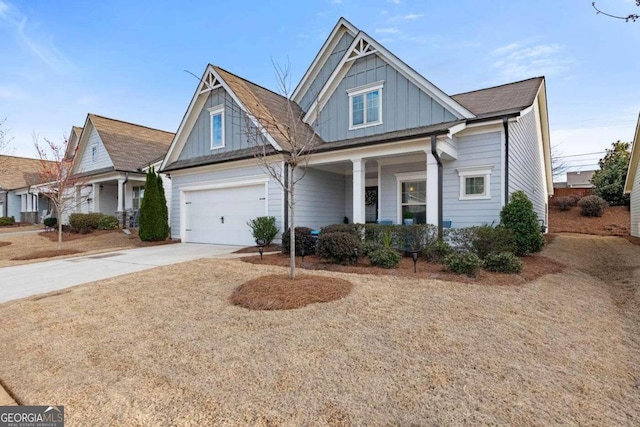 view of front facade featuring a garage and a porch