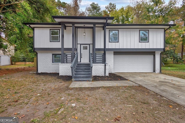 bi-level home featuring a garage