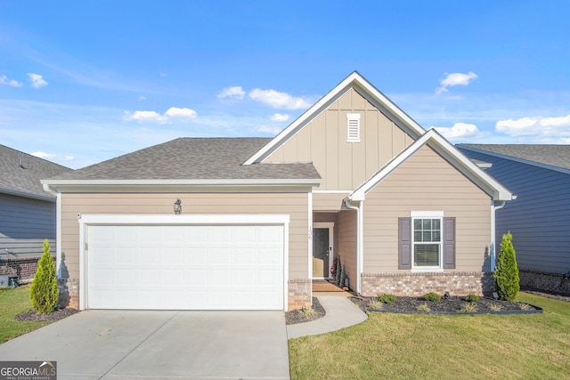 view of front facade featuring a garage and a front lawn