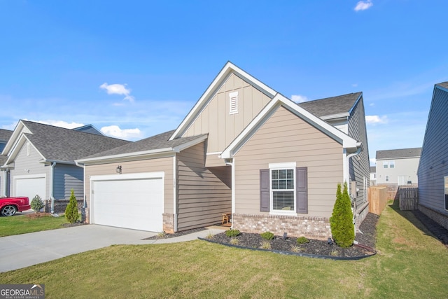 view of front facade featuring a garage and a front yard