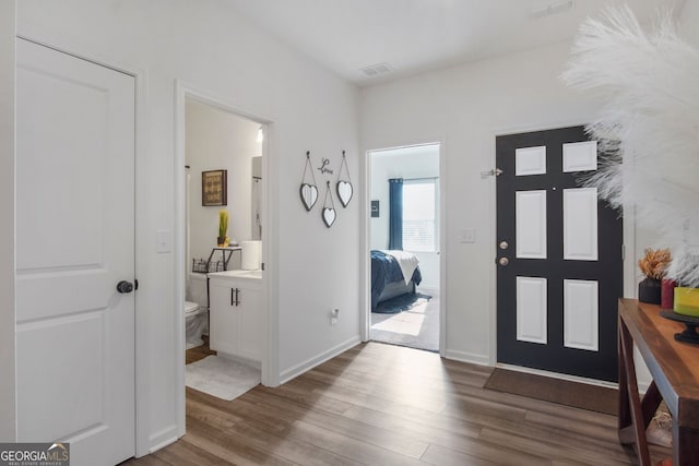 entrance foyer with hardwood / wood-style flooring