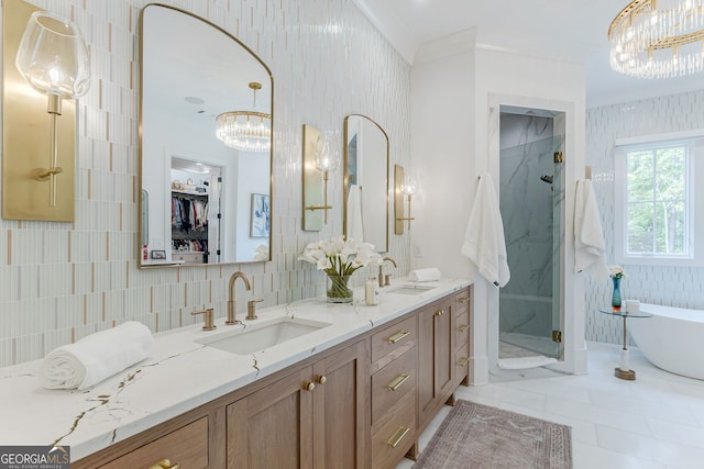 bathroom featuring tile walls, tile patterned flooring, vanity, crown molding, and independent shower and bath