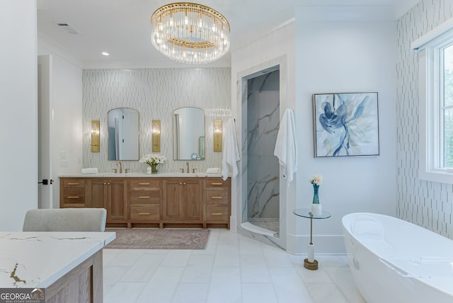 bathroom featuring a chandelier, vanity, plus walk in shower, and a healthy amount of sunlight