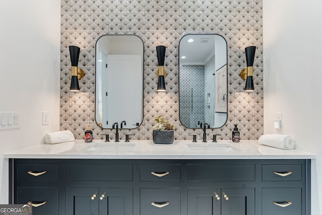 bathroom with vanity and tasteful backsplash