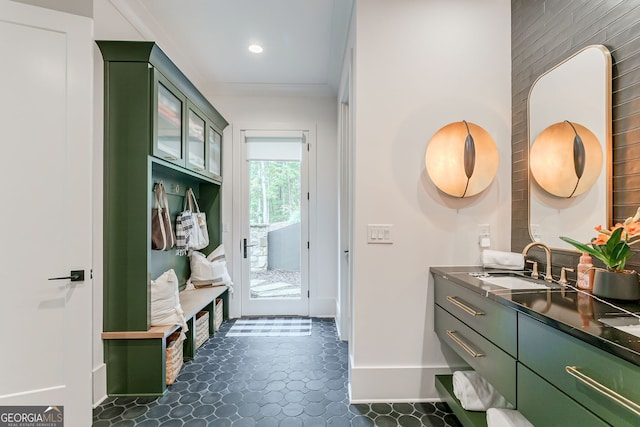 bathroom with tile patterned flooring and vanity