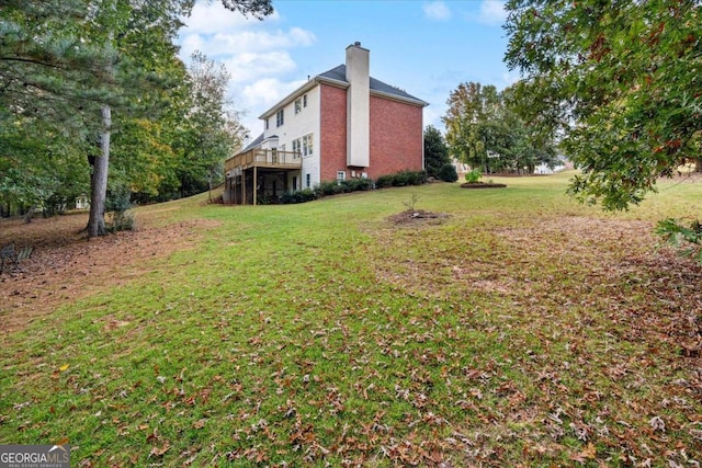 view of yard with a deck