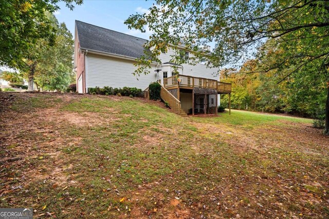 view of yard with a deck