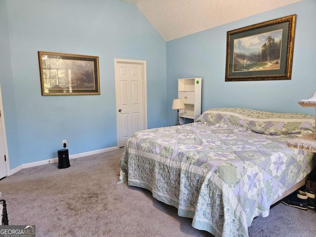 bedroom with carpet and lofted ceiling