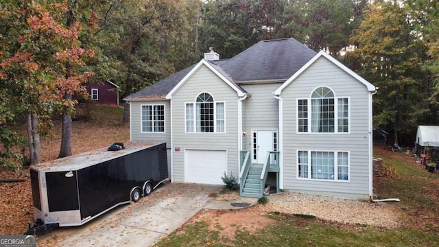 bi-level home featuring a garage