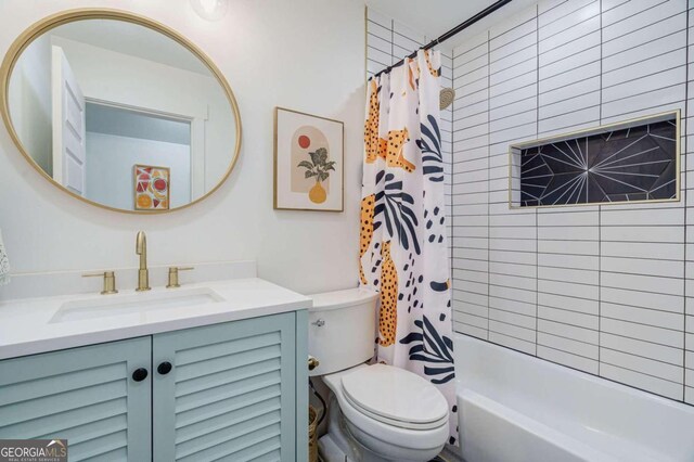 full bathroom with vanity, toilet, and shower / bathtub combination with curtain