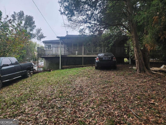 view of yard with a deck