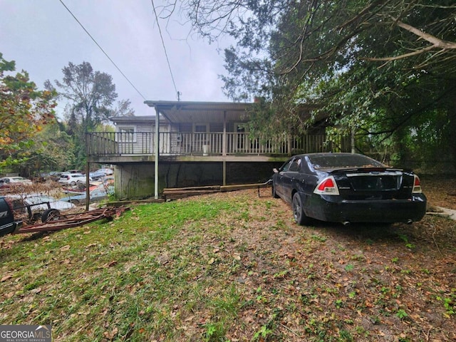 view of yard with a deck