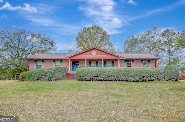 single story home with a front yard