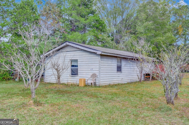 view of property exterior featuring a yard