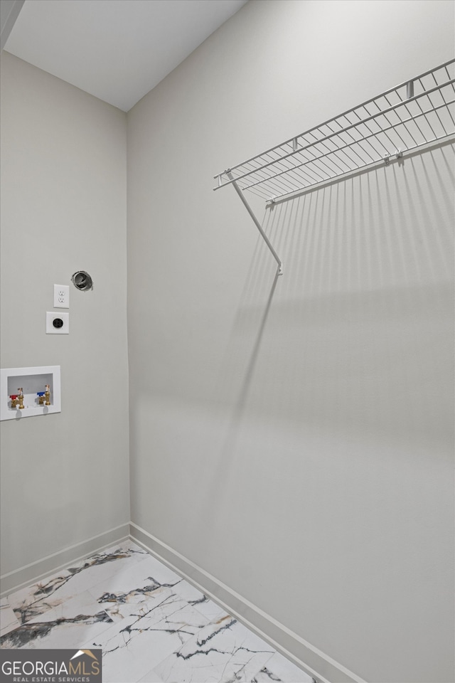 clothes washing area with hookup for a washing machine and electric dryer hookup