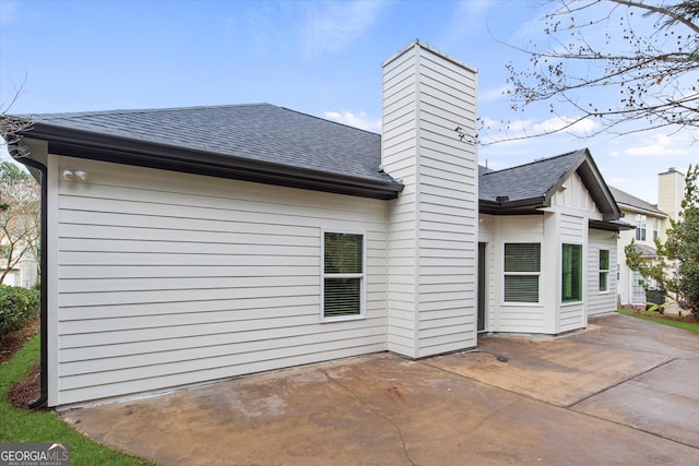 rear view of house featuring a patio