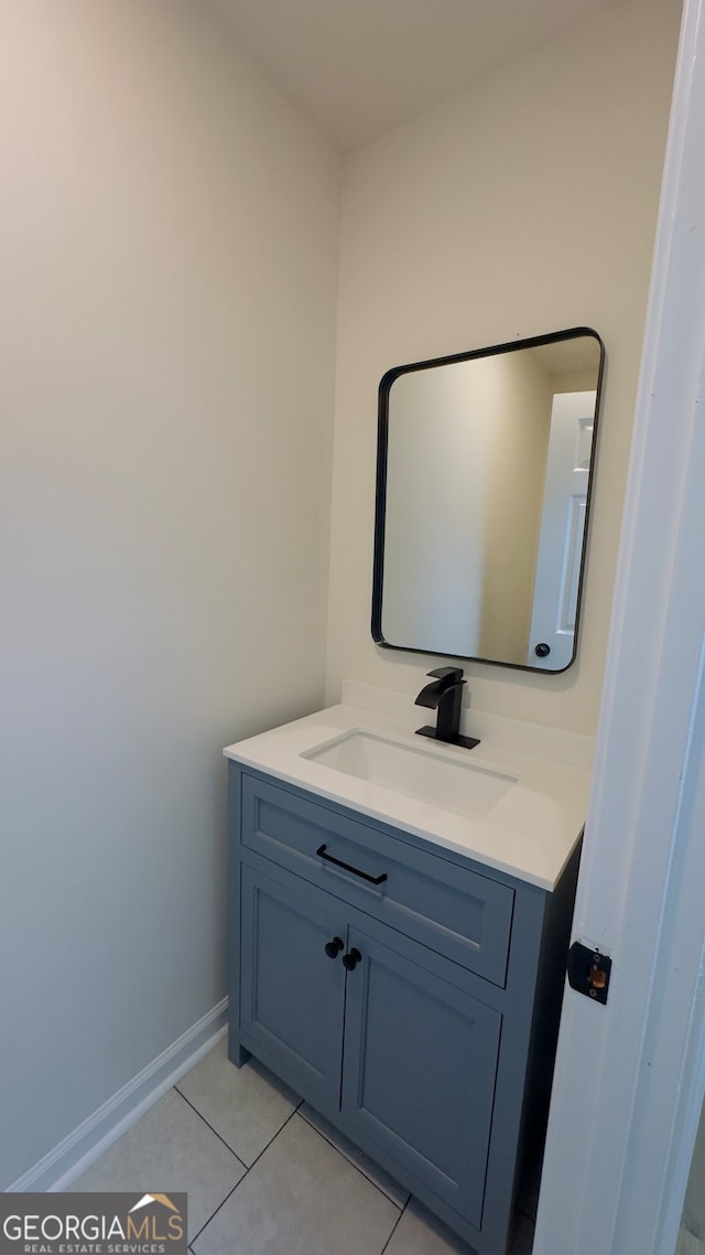 bathroom featuring vanity and tile patterned flooring