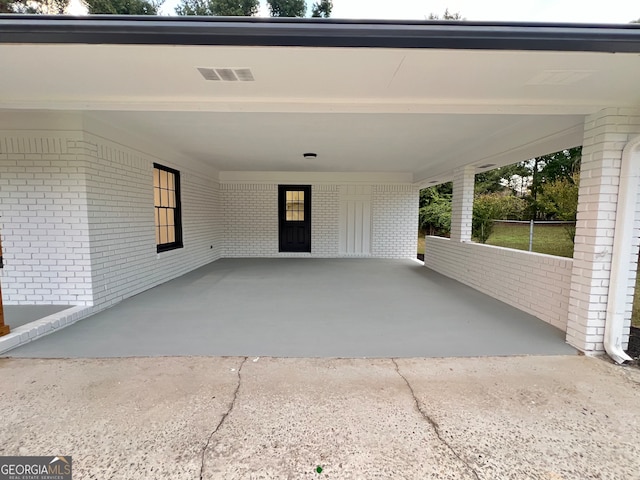 view of patio with a carport