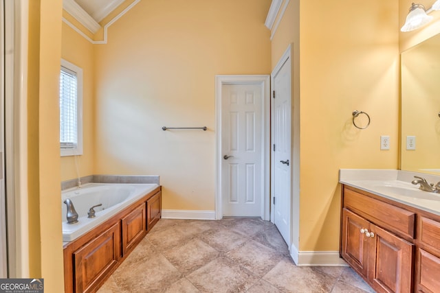 bathroom featuring ornamental molding, a bathing tub, and vanity