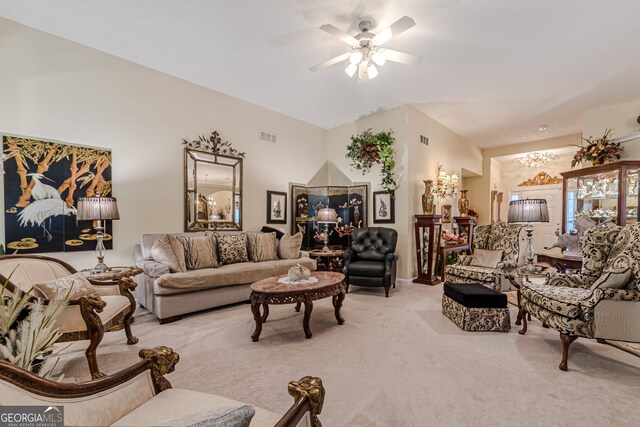 living room with light colored carpet and ceiling fan