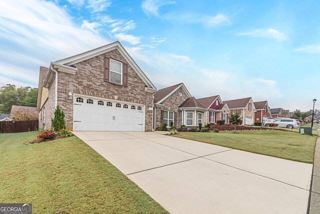 front facade featuring a front yard and a garage