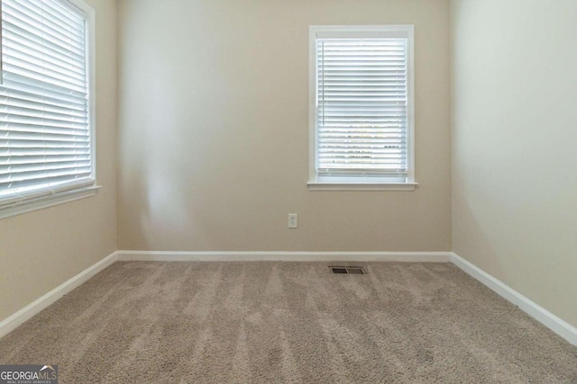 view of carpeted spare room