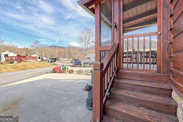 stairway featuring a mountain view