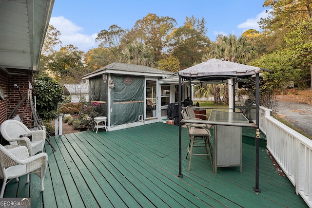 wooden terrace with a gazebo