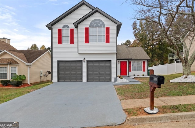 front facade featuring a garage and a front lawn